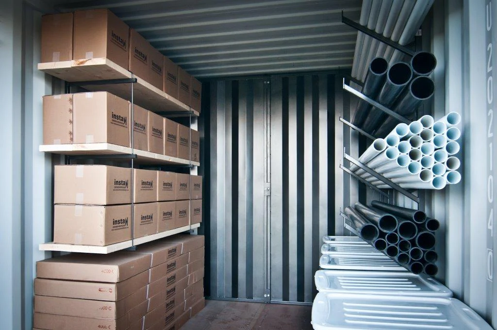 Shipping container accessories and stock organised inside a container
